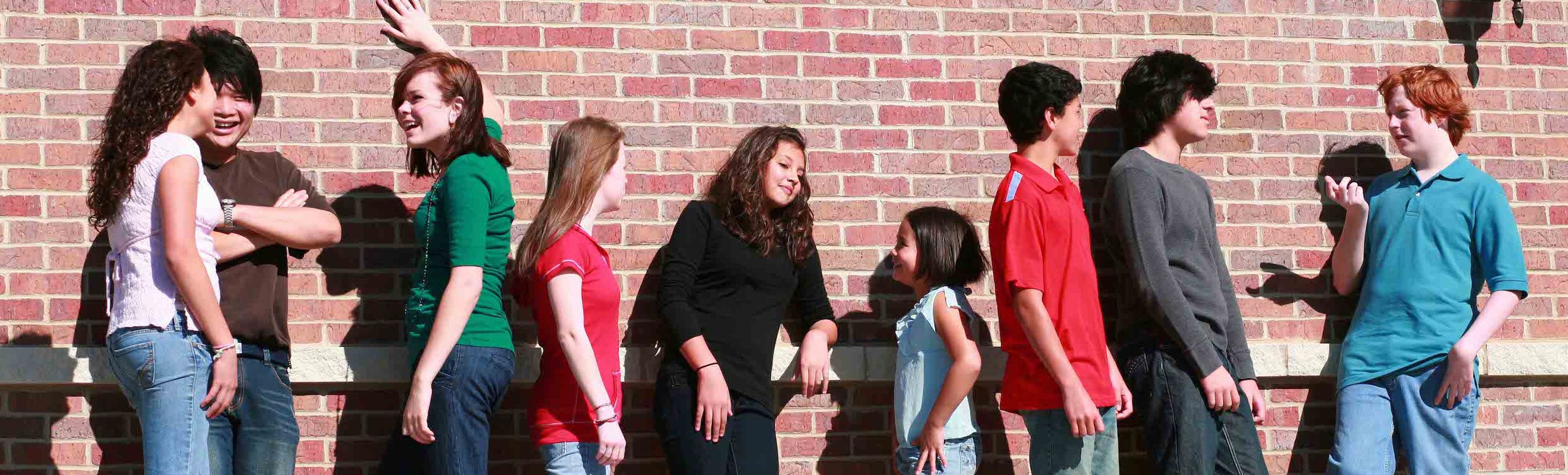 shutterstock_24753979 teenagers hanging out outside school